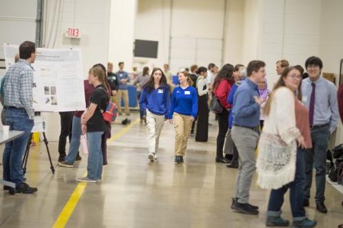 Visiting students walk through the Shape Corp. Innovation Design Center.