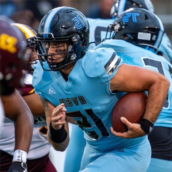 GVSU quarterback Avery Moore runs with the ball against Central State.