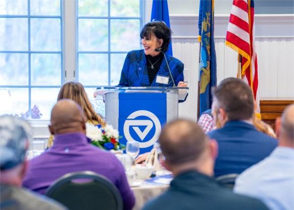 GVSU President Philomena V. Mantella at the podium.