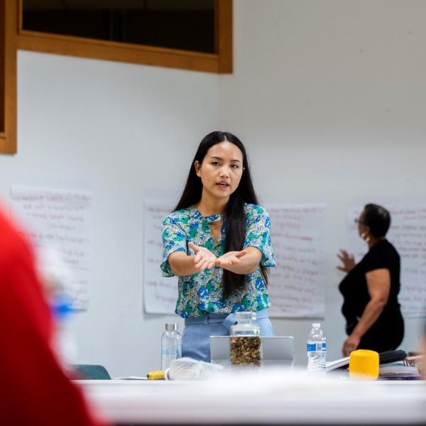 Jenifer Pui, education engagement program administrator at GVSU's Burma Center, conducts a session with students during a REP4 conference in 2021.