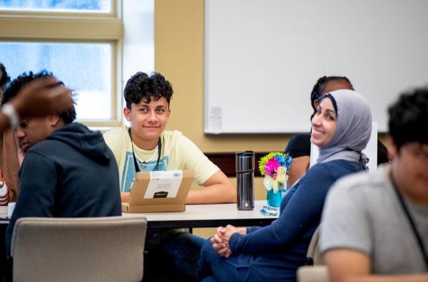 Students and mentors working together at a REP4 regional summit in Detroit.