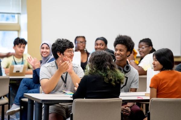 Students and mentors working together at a REP4 regional summit in Detroit.